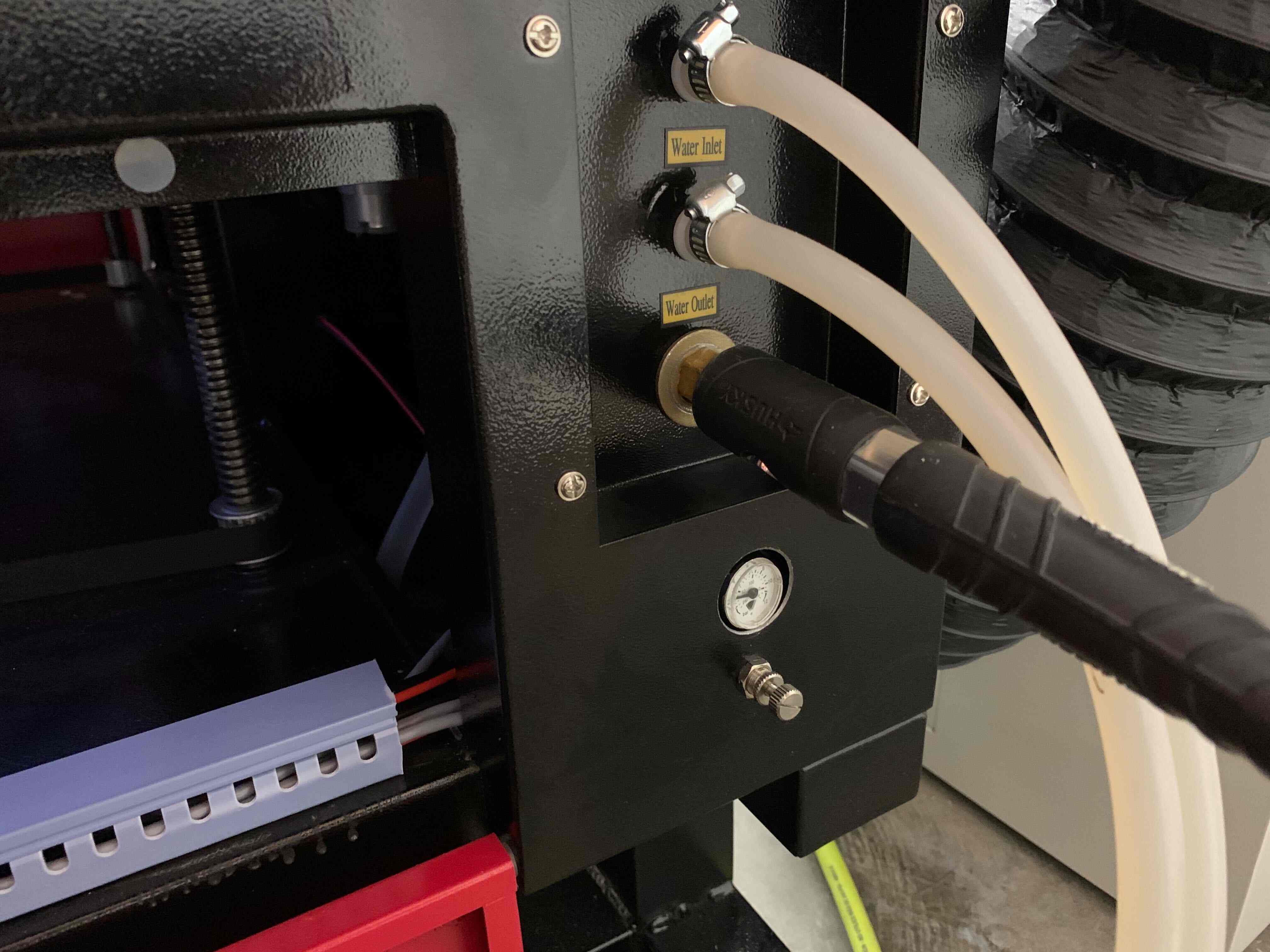 Back panel with regulator, pressure gauge, and hose connection